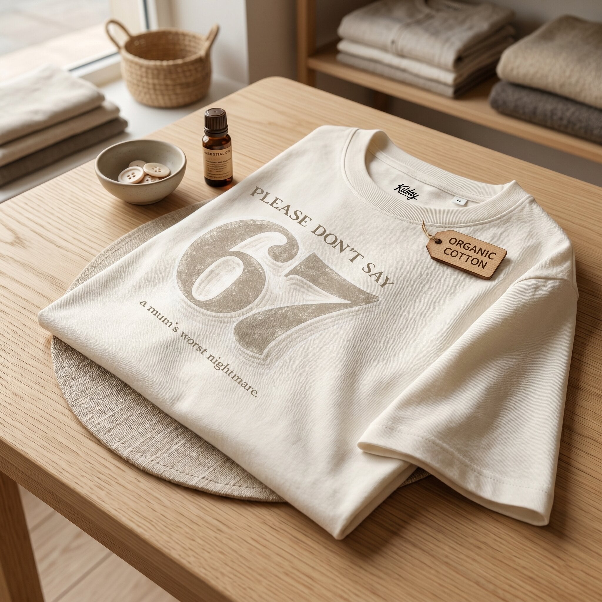 Kiksy cream funny mum t-shirt featuring the slogan Please don't say 67 a mum's worst nightmare