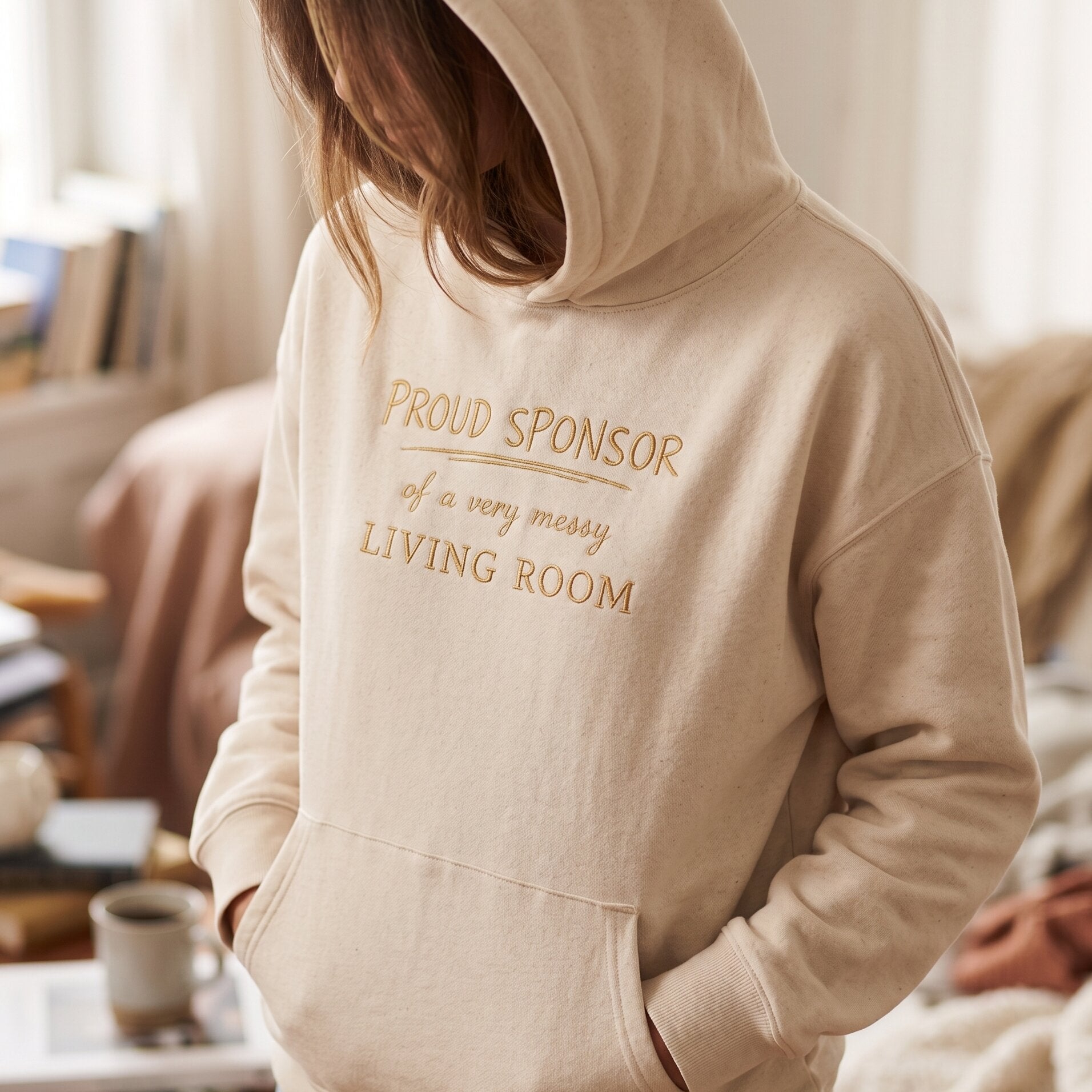 ‘PROUD SPONSOR of a very messy LIVING ROOM’ Statement Hoodie