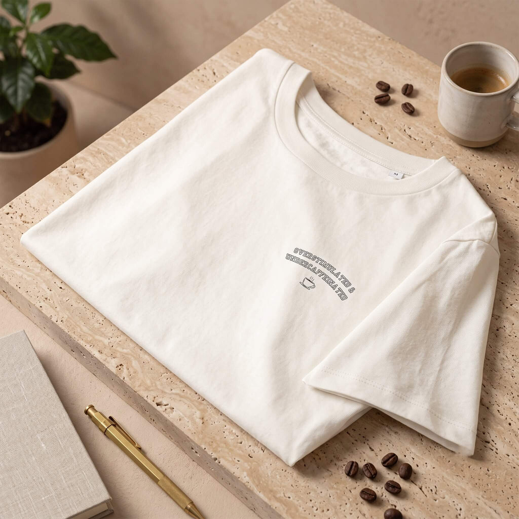 Kiksy white slogan t-shirt reading Overstimulated and Undercaffeinated